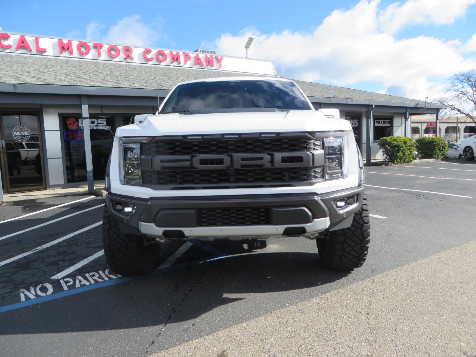 2023 White /BLACK Ford F-150 Raptor SuperCrew 4WD (1FTFW1RG6PF) with an 3.5 V6 engine, 6A transmission, located at 2630 Grass Valley Highway, Auburn, CA, 95603, (530) 508-5100, 38.937893, -121.095482 - Raptor sitting on Eibach front and rear springs, 37" Nitto Ridge Grappler tires, 17" Method NV wheels, and window tint. - Photo #1